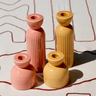 Earthen candlestick holder set